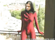 Angie in red spandex suit