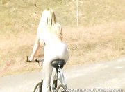 Katherina topless on bike