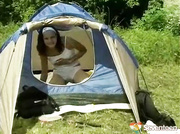 Teenager masturbating in a tent