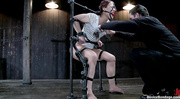 Gagged teenage redhead can't stop cumming when enchained and suspended upside down