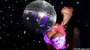 Gorgeous babe loves to seduce behind the crystal ball before she poses and shakes her erotic body while letting her vari-colored underwear glow in a dark room full of neon stars.