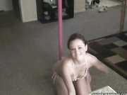 Beautiful babe wiggling her luscious body in her pink a white bikini while dancing on a pole before she grabs her purple dildo then shoves it in her twat in different positions.